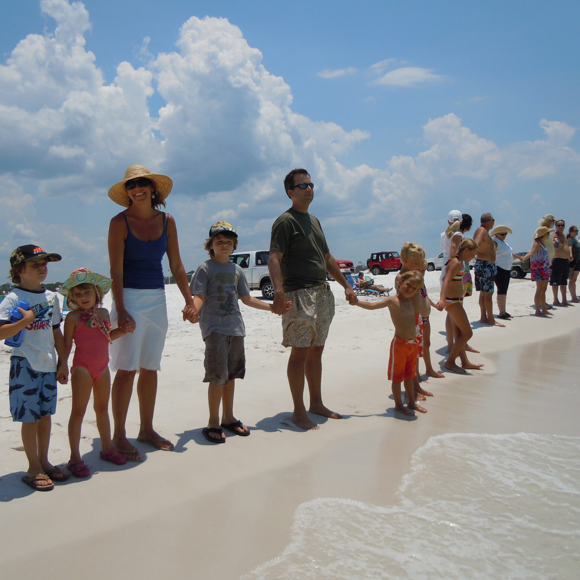 2010. Riki Ott. Graton Beach, Florida. Hands Across the Sands Rally to say NO to fossil fuels and YES to clean energy. 