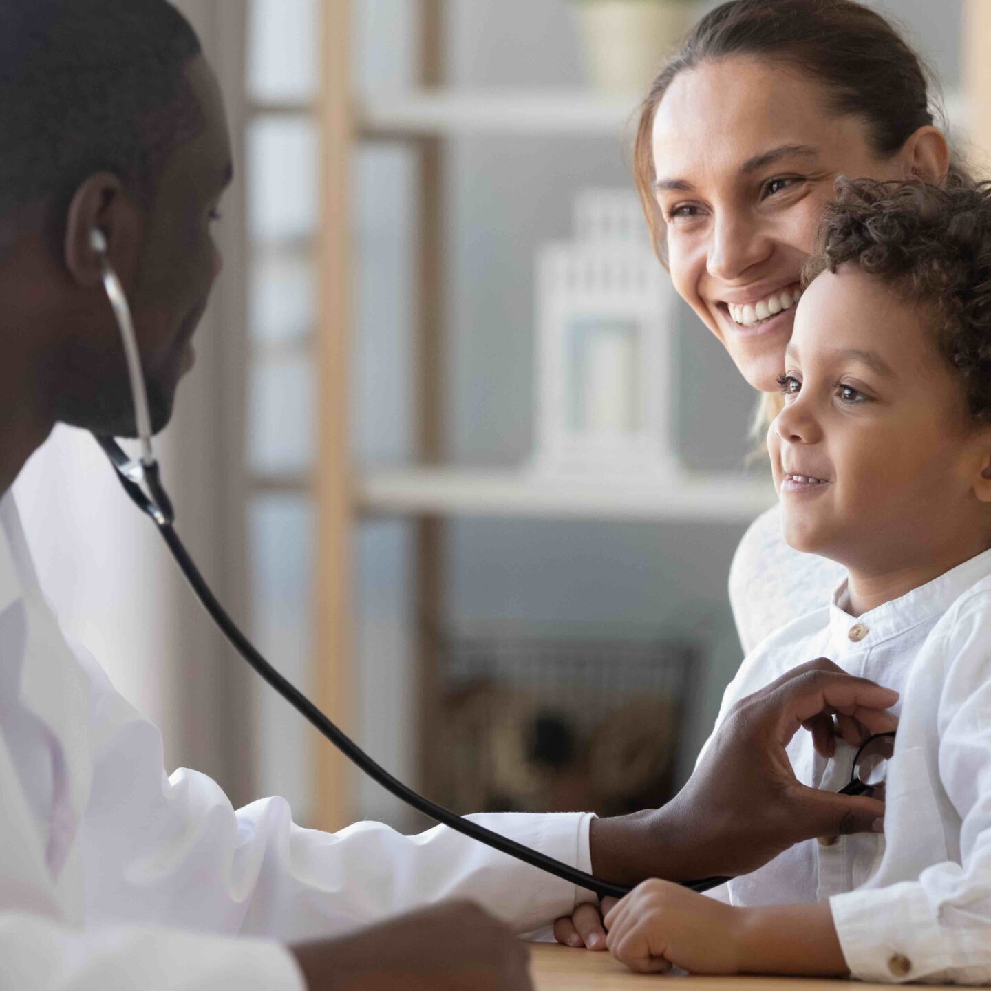 African,Male,Pediatrician,Hold,Stethoscope,Exam,Child,Boy,Patient,Visit